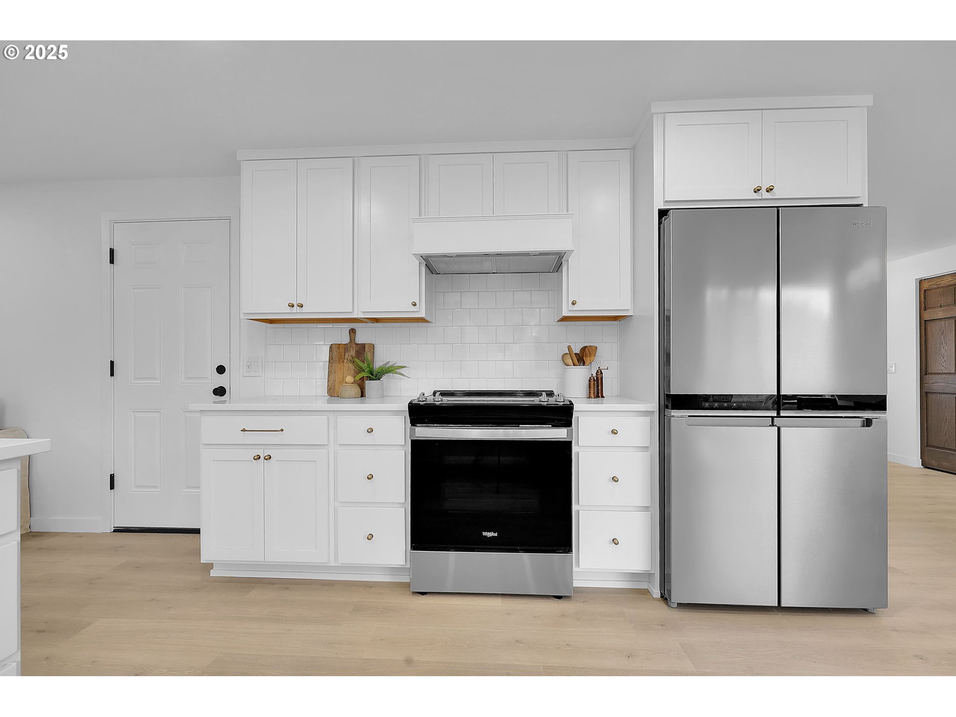 1090 Dixie Drive Springfield, OR 97478 - Photo 14 of 48 a kitchen with stainless steel appliances a refrigerator sink and cabinets