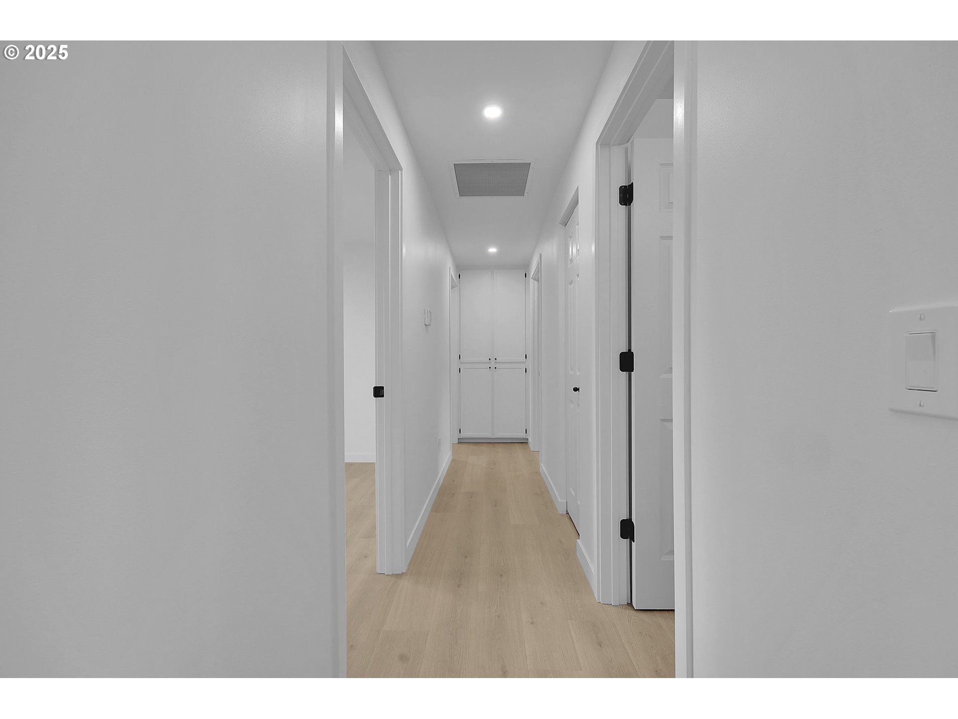 1090 Dixie Drive Springfield, OR 97478 - Photo 24 of 48 a view of a hallway with wooden floor