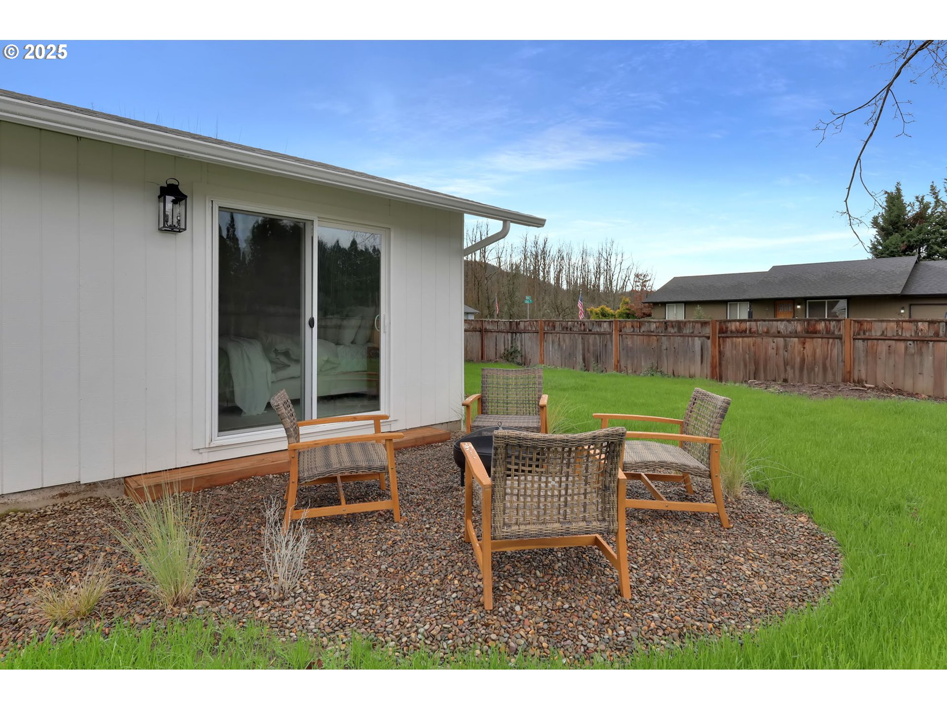 1090 Dixie Drive Springfield, OR 97478 - Photo 40 of 48 a chair and table sitting in backyard of the house