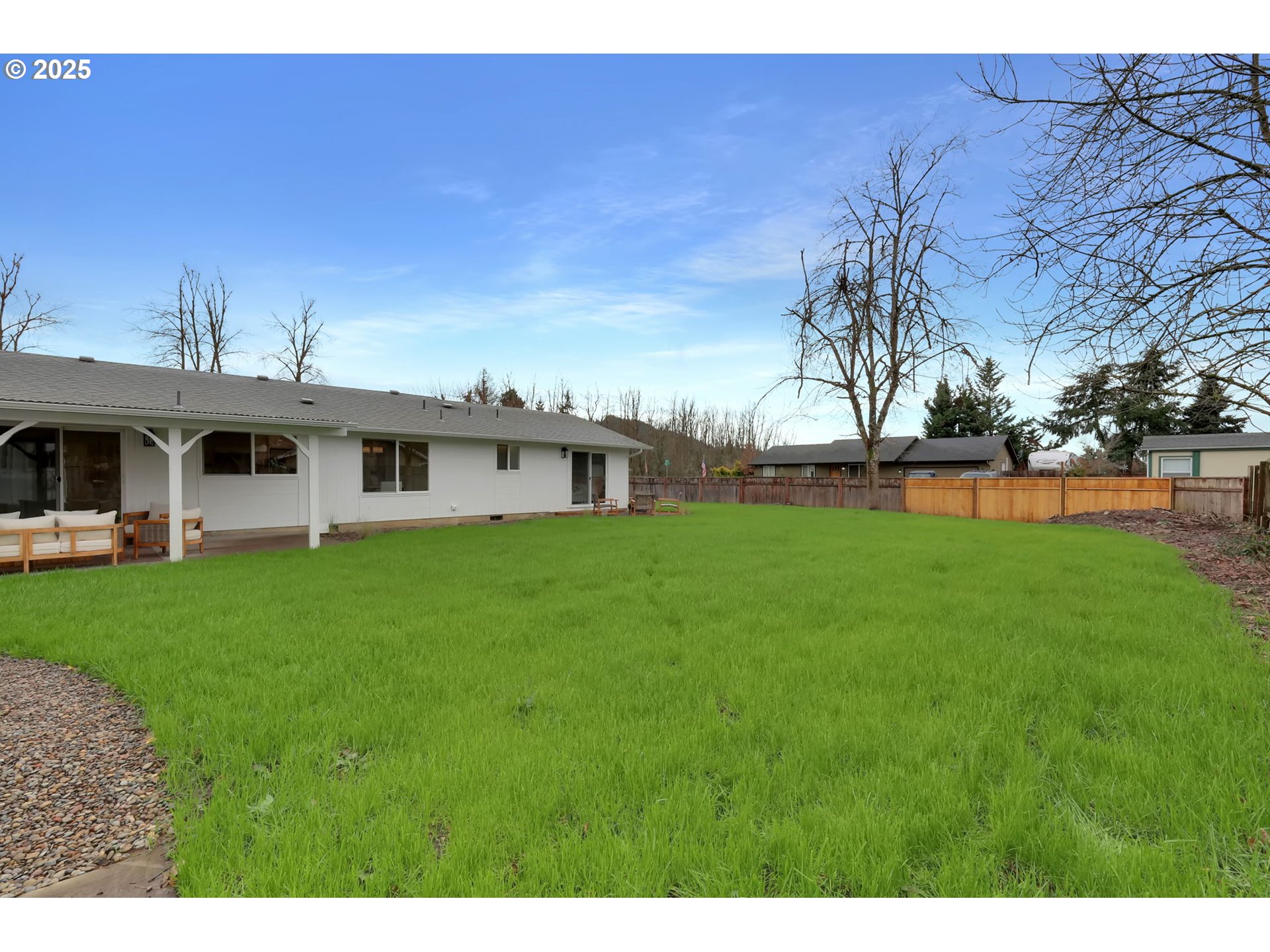 1090 Dixie Drive Springfield, OR 97478 - Photo 46 of 48 a view of a house with a backyard