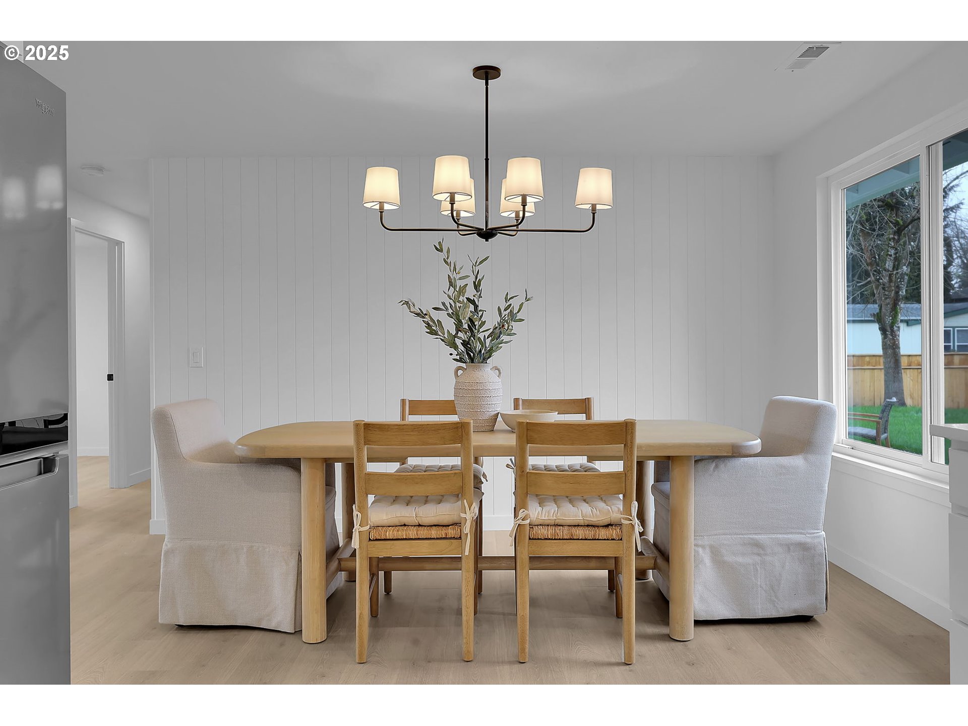 1090 Dixie Drive Springfield, OR 97478 - Photo 9 of 48 a view of a dining room with furniture and wooden floor