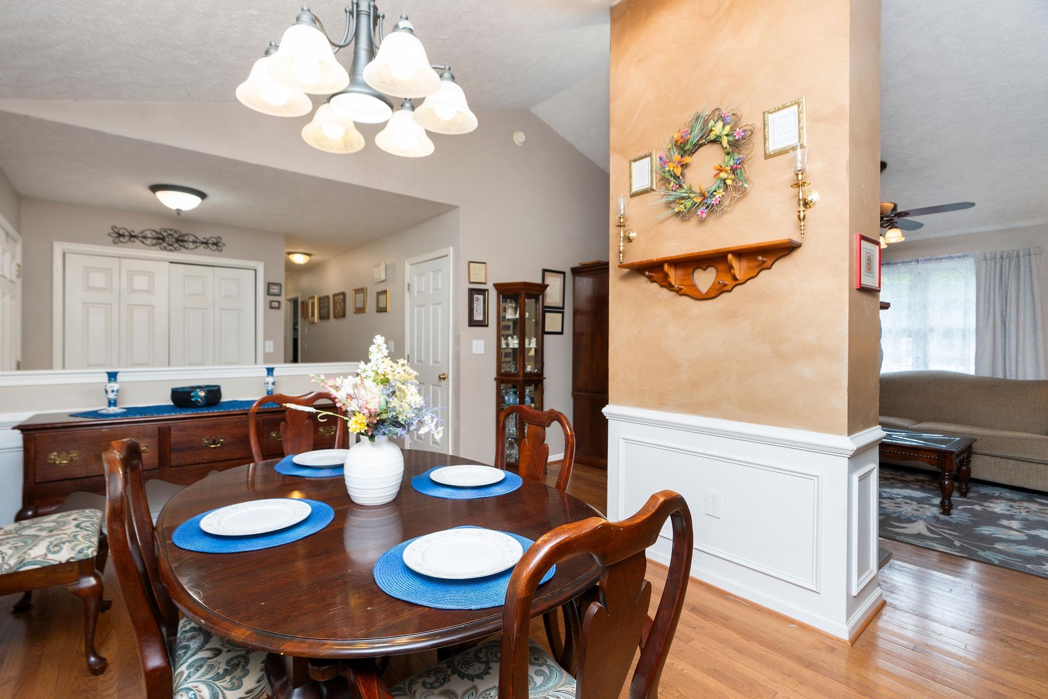 516 Estaline Valley Road Craigsville, VA 24430 - Photo 21 of 75 a view of a dining room with furniture wooden floor and chandelier