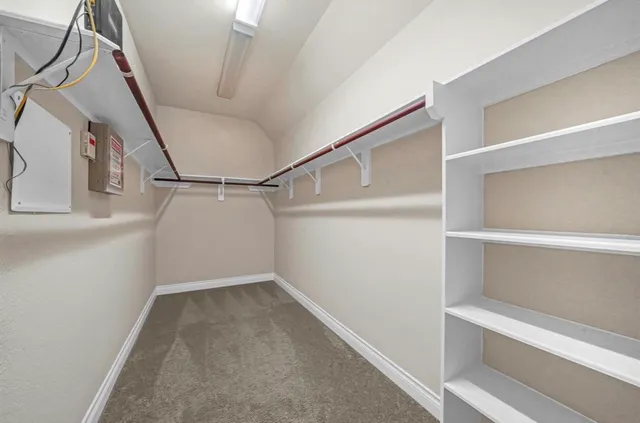 a view of an empty walk in closet