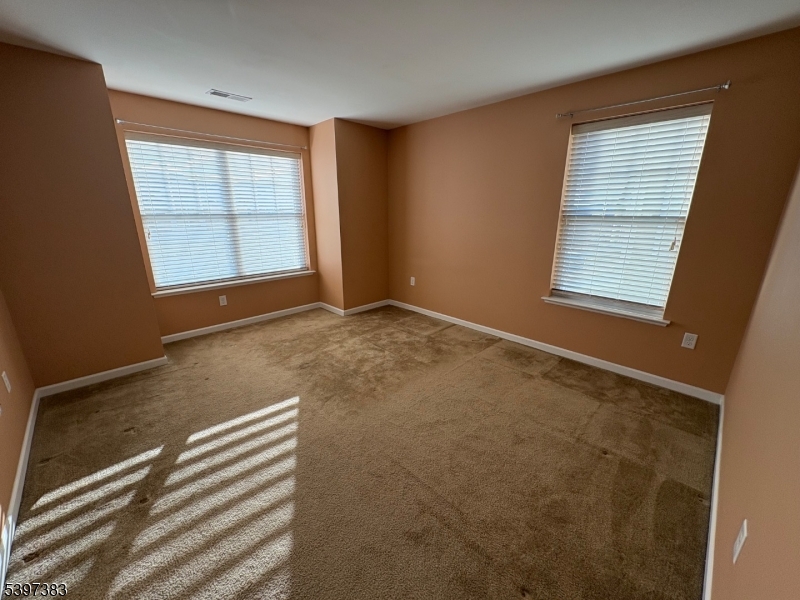 17 Alexanders Road Hackettstown, NJ 07840 - Photo 6 of 14 an empty room with windows