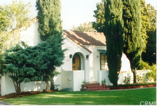 1371 Cleveland Road Glendale, CA 91202 - Photo 1 of 1 a front view of a house with a garden