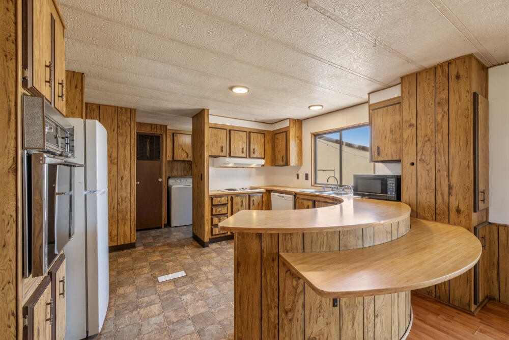31410 Union Street Bonanza, OR 97623 - Photo 7 of 37 a kitchen with refrigerator and windows