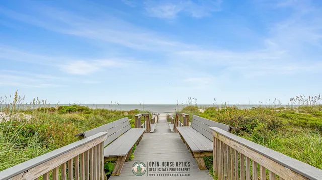 a kitchen with granite countertop a sink and cabinets