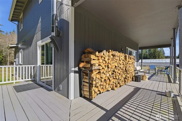 a view of a balcony with wooden floor