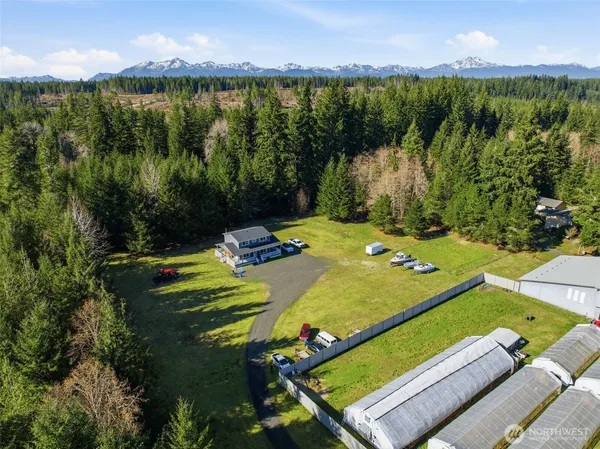 a view of a pool and a yard
