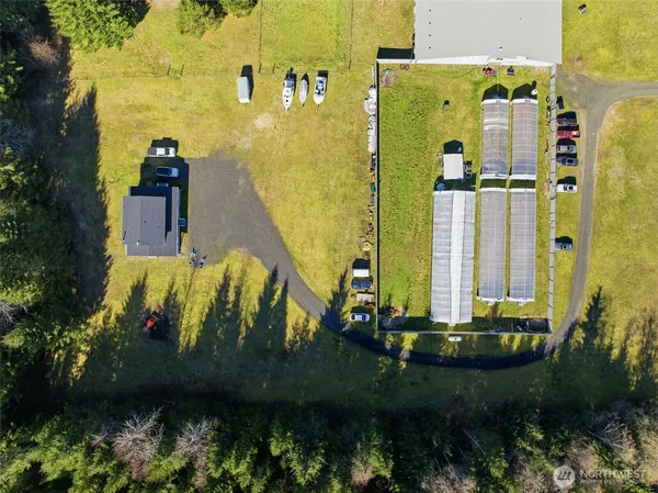 a aerial view of a house with a yard
