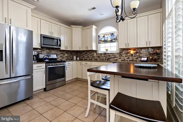 a view of a livingroom with furniture and window