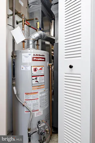 a room with a bed and a window