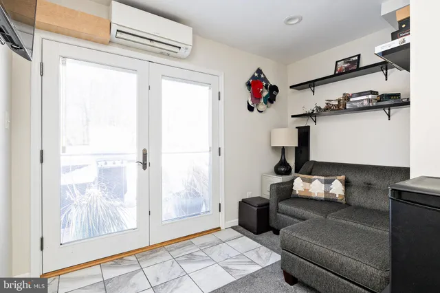 a bathroom with a bath tub and shower