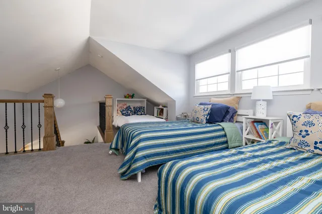 a view of a house with a yard and plants
