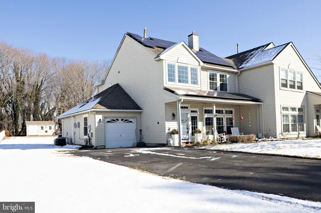 a front view of a building with street view