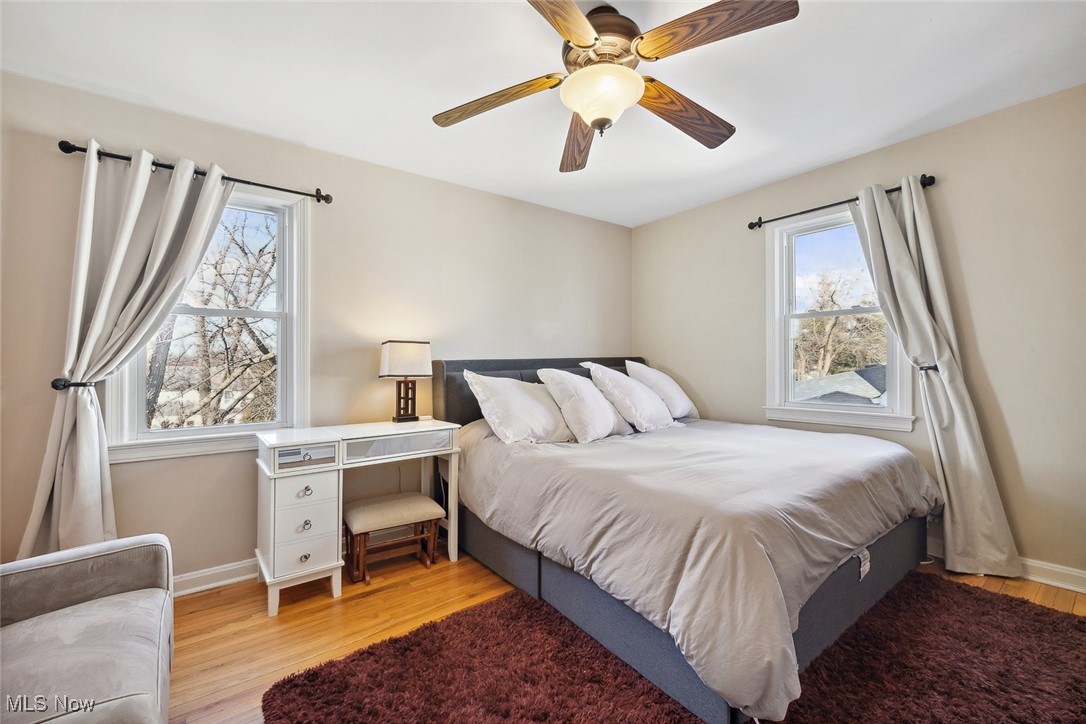 1444 Gordon Road Lyndhurst, OH 44124 - Photo 15 of 33 Bedroom featuring ceiling fan and light wood-type flooring