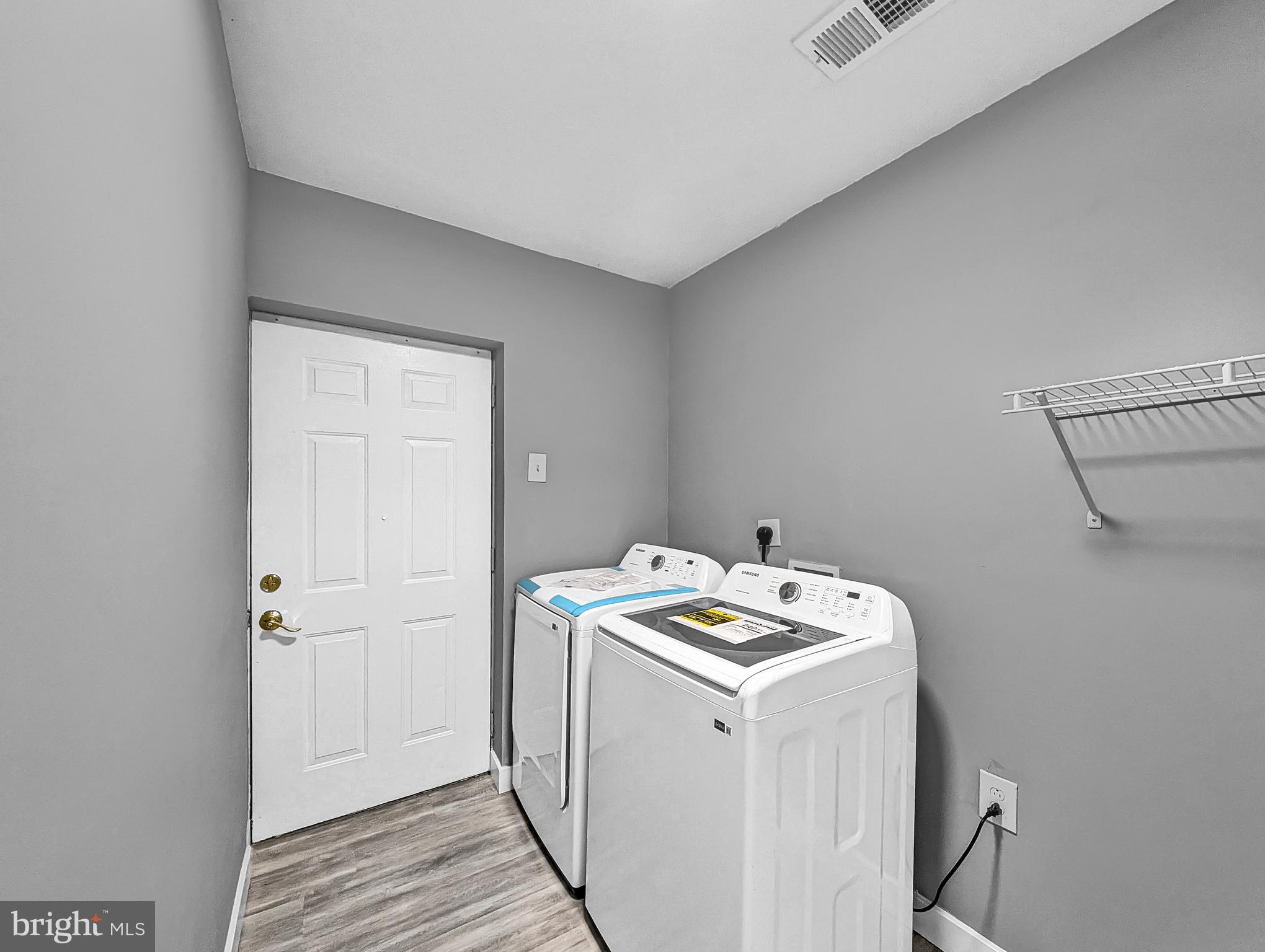 2240 15th Street Northeast Washington, DC 20018 - Photo 8 of 22 a utility room with dryer and washer