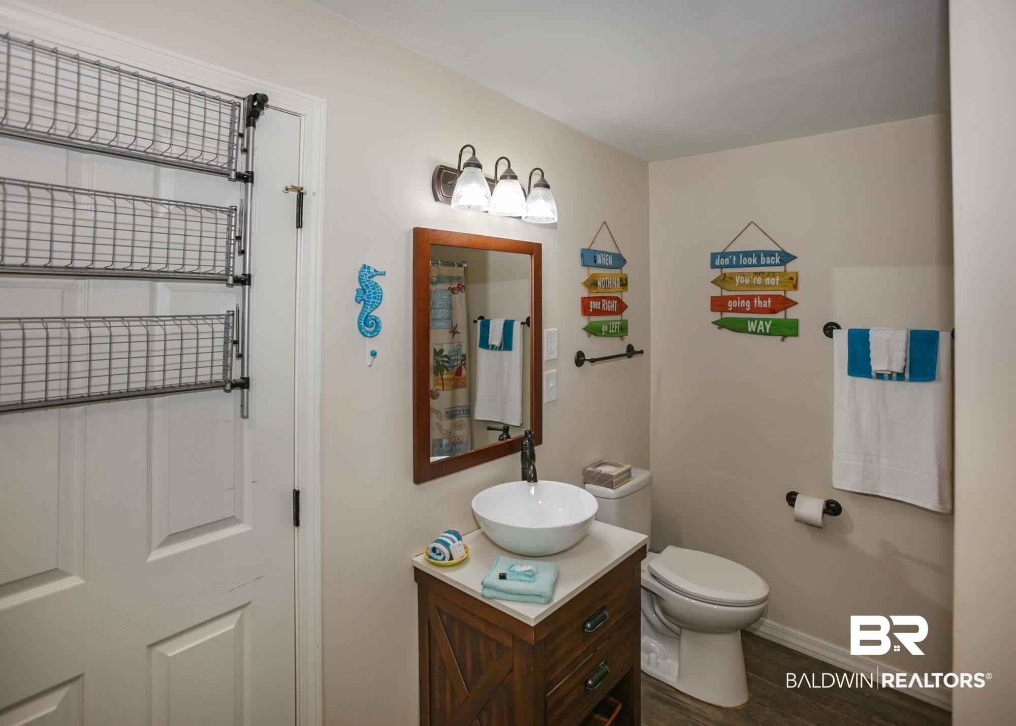 18753 County Road 12 Foley, AL 36535 - Photo 36 of 39 Bathroom with hardwood / wood-style flooring, vanity, and toilet