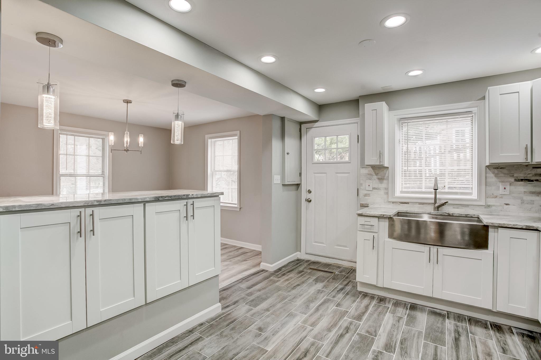 2308 Pickwick Road Baltimore, MD 21207 - Photo 3 of 40 Refreshing Open Layout, All New Kitchen