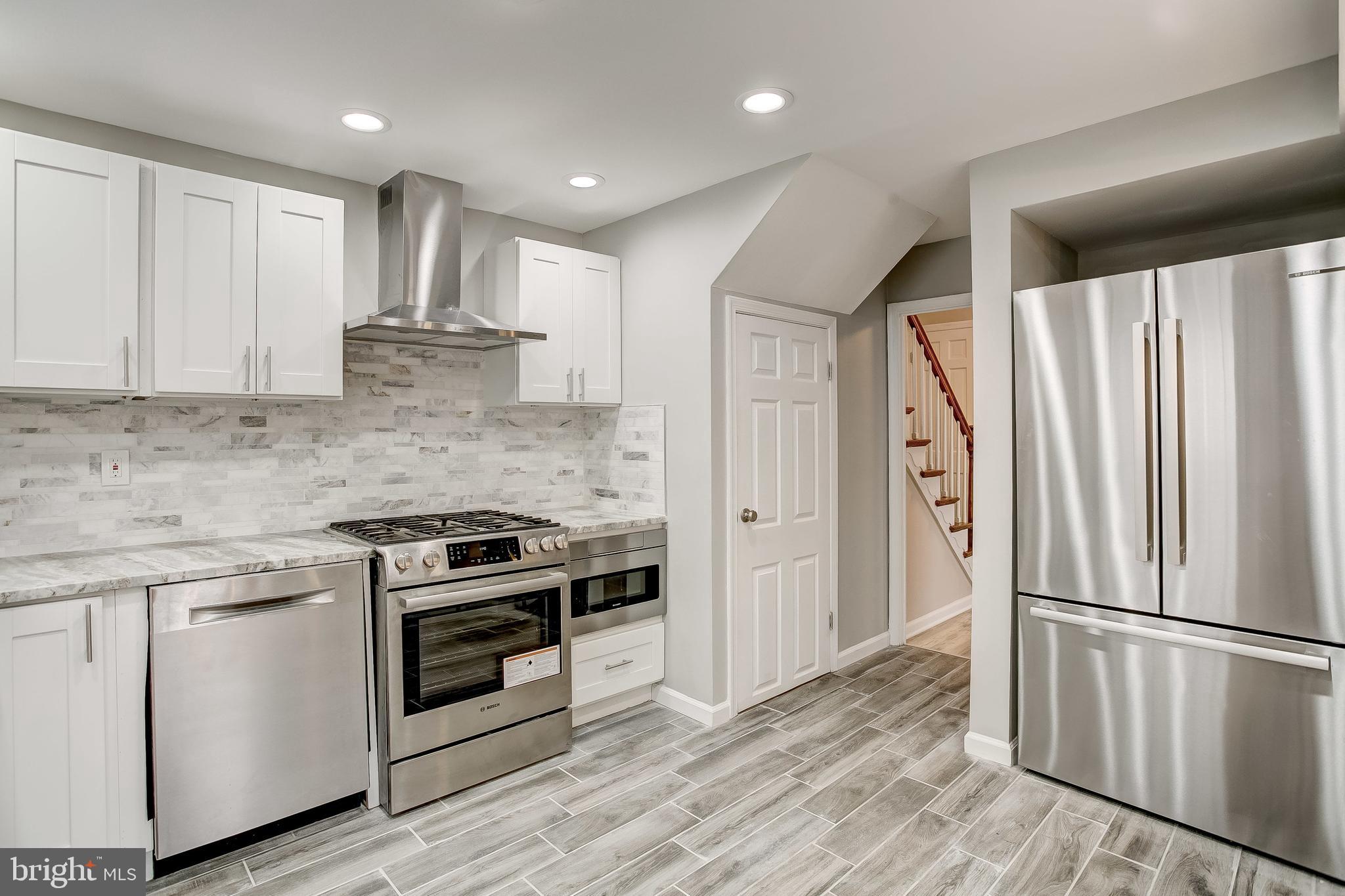 2308 Pickwick Road Baltimore, MD 21207 - Photo 6 of 40 Range Hood, Dishwasher with Hidden Controls