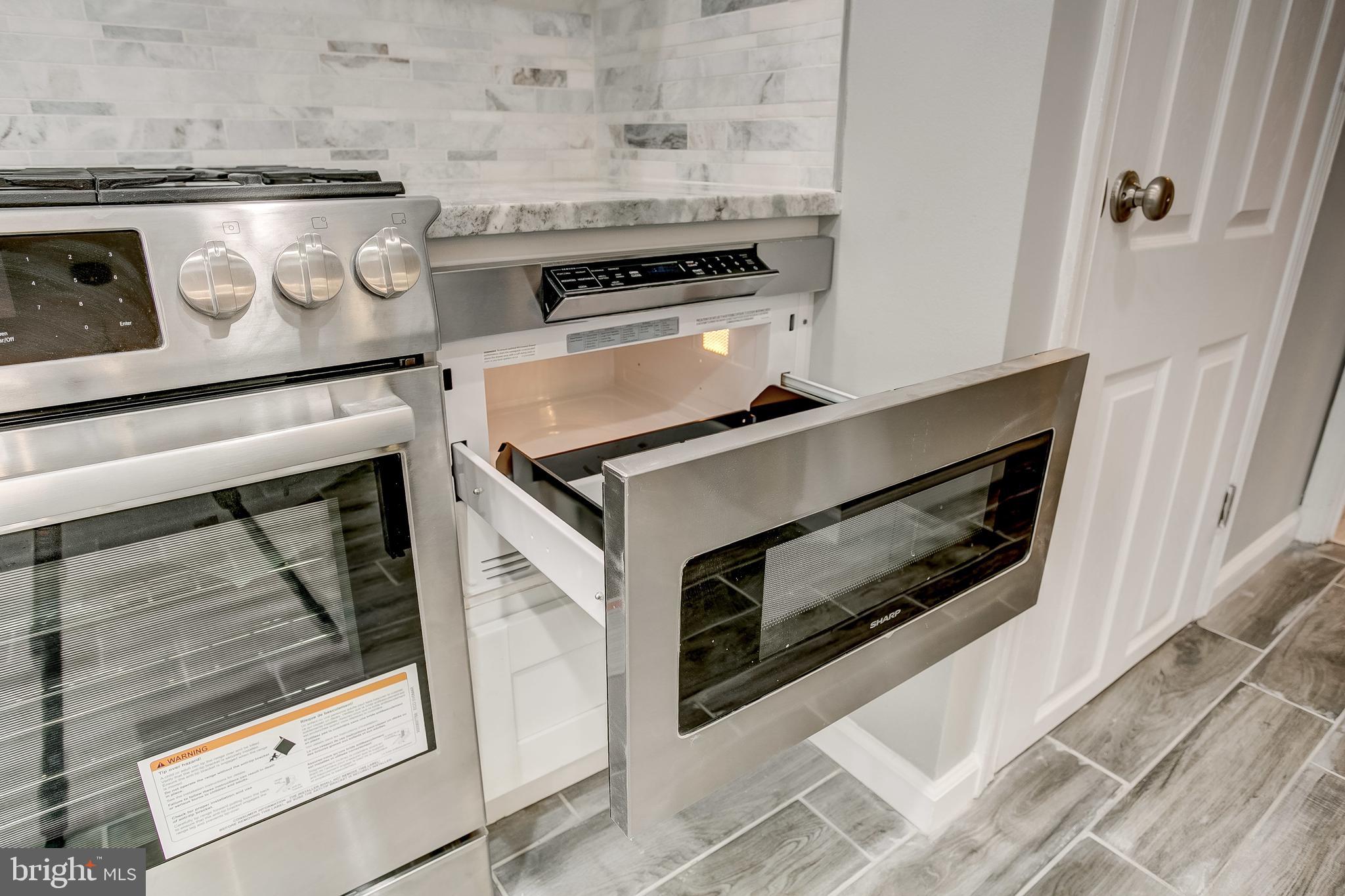 2308 Pickwick Road Baltimore, MD 21207 - Photo 8 of 40 Retracting Microwave Drawer