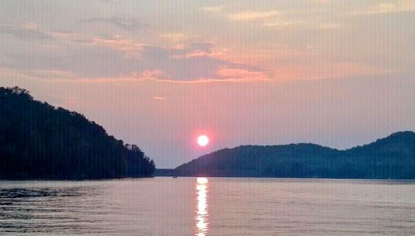 977 Raccoon Ridge Northeast Ranger, GA 30734 - Photo 6 of 6 a sunset view with a lake