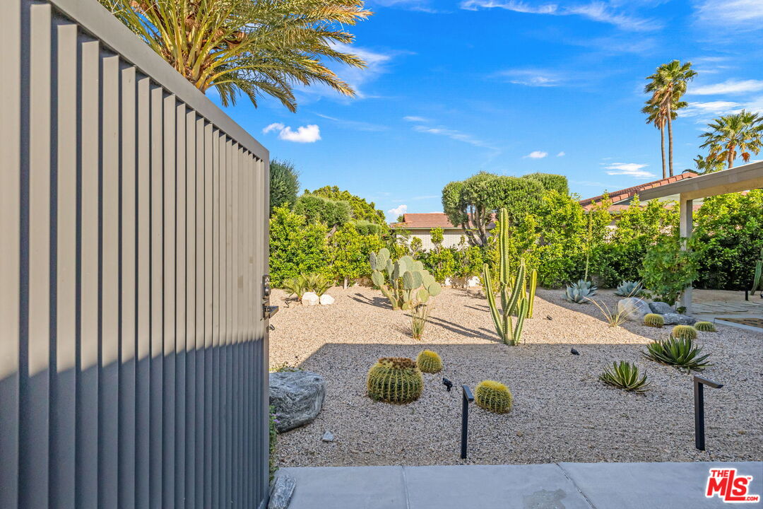 66869 San Ardo Road Desert Hot Springs, CA 92240 - Photo 4 of 39 a house view with a garden space