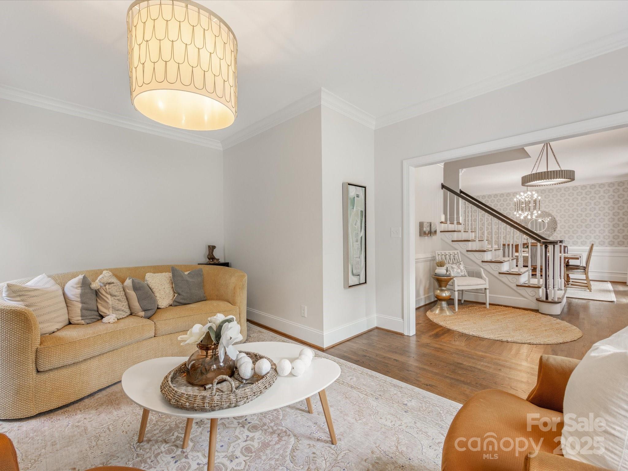 3137 Broadfield Road Charlotte, NC 28226 - Photo 12 of 42 a living room with furniture and a table