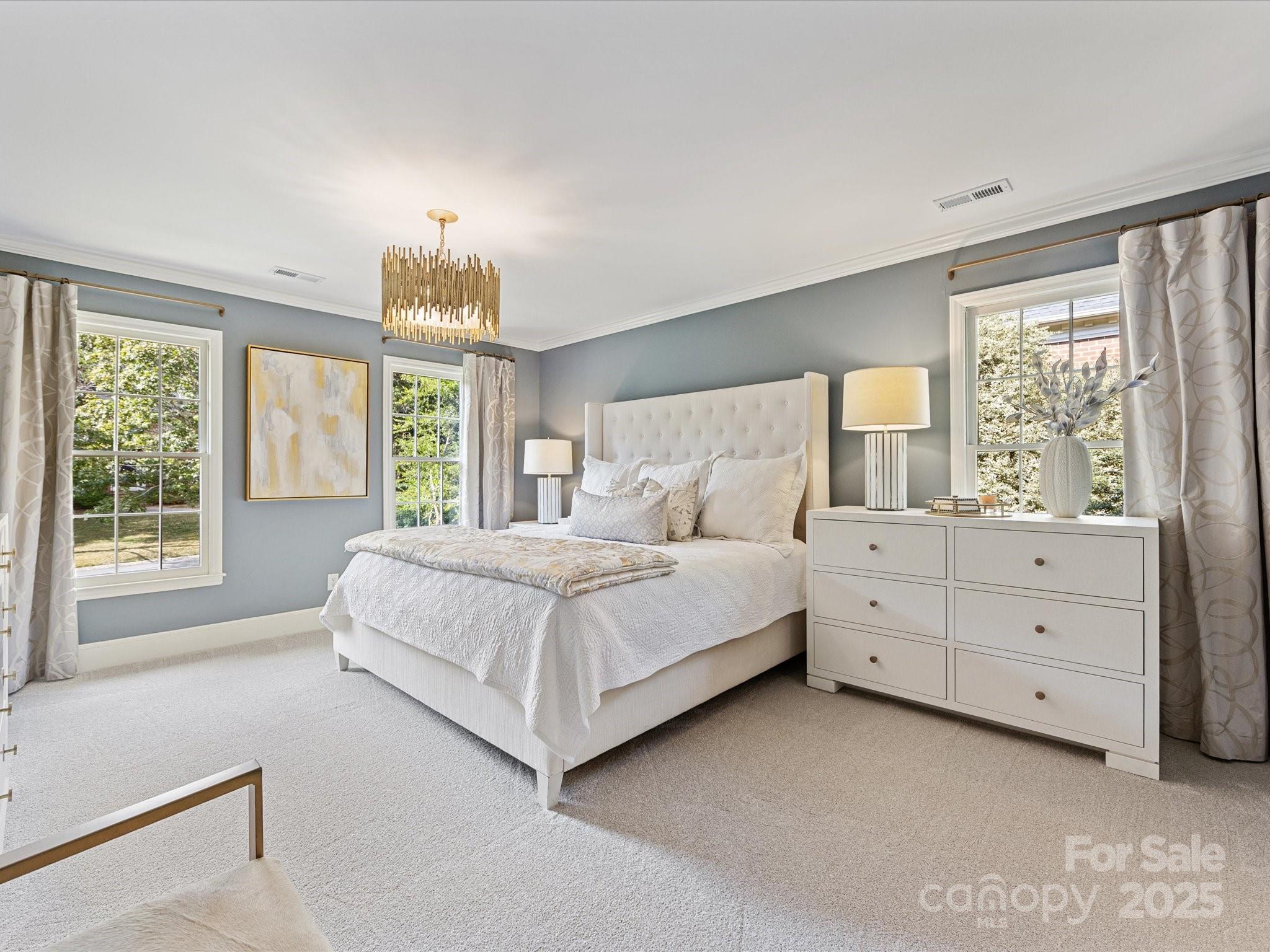 3137 Broadfield Road Charlotte, NC 28226 - Photo 17 of 42 a bedroom with a bed and a window