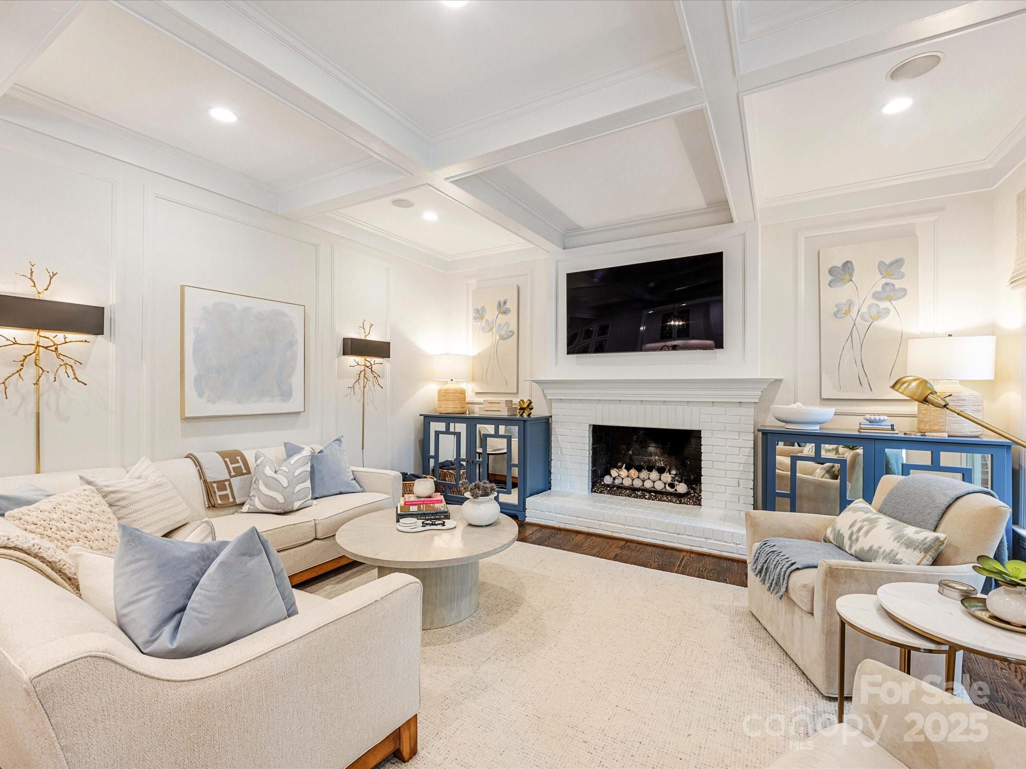 3137 Broadfield Road Charlotte, NC 28226 - Photo 2 of 42 a living room with furniture a fireplace and flat screen tv