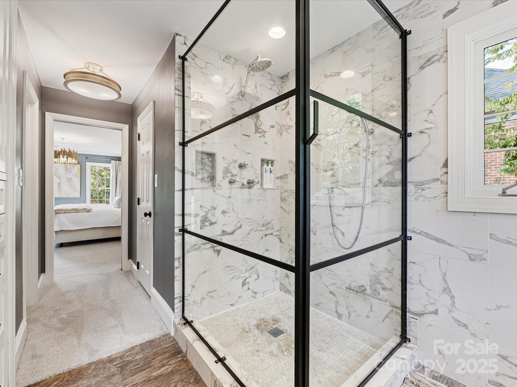 3137 Broadfield Road Charlotte, NC 28226 - Photo 22 of 42 a view of a hallway with wooden floor and staircase