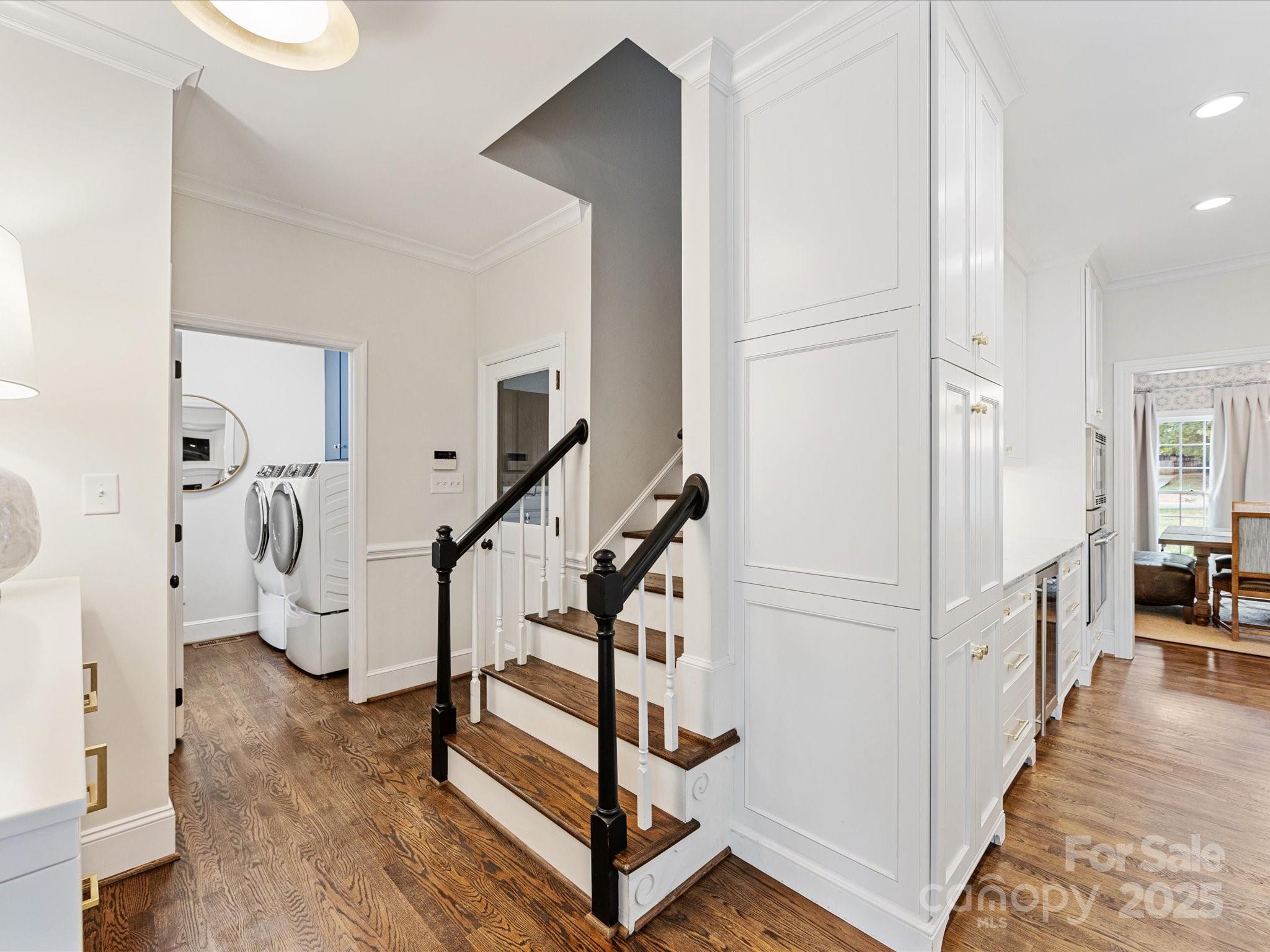 3137 Broadfield Road Charlotte, NC 28226 - Photo 33 of 42 a view of an entryway with wooden floor