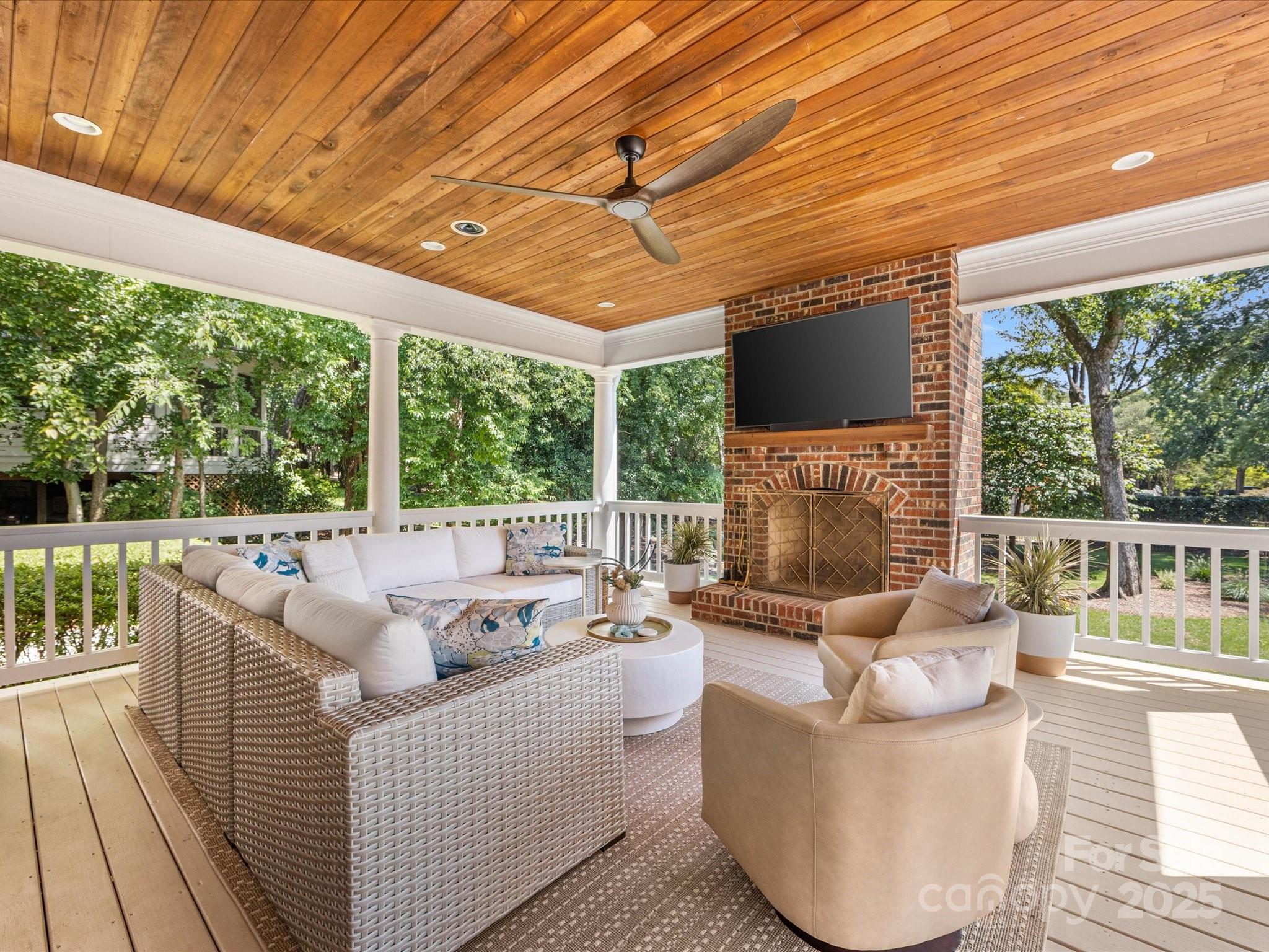 3137 Broadfield Road Charlotte, NC 28226 - Photo 35 of 42 a balcony with furniture and a garden view