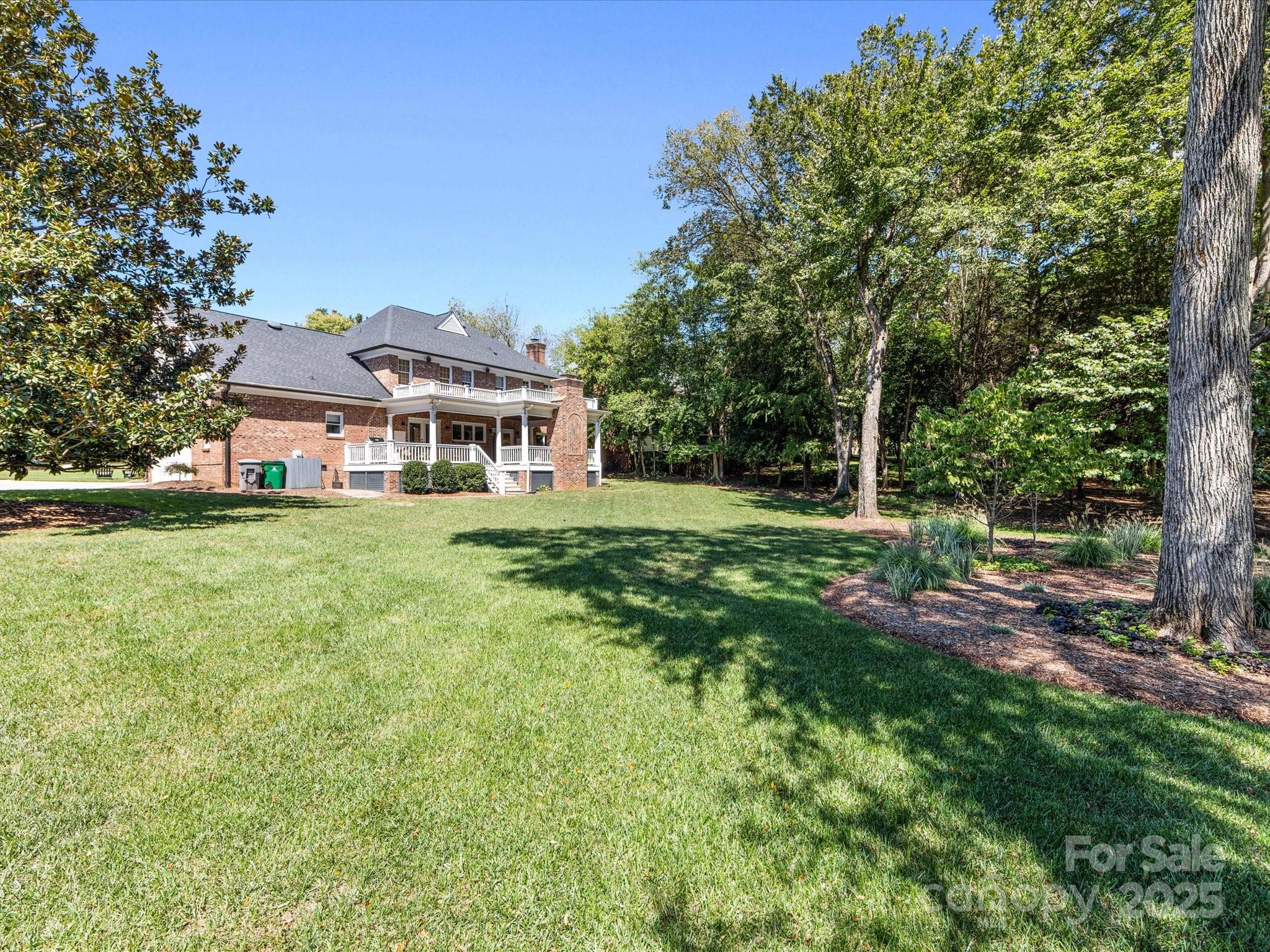 3137 Broadfield Road Charlotte, NC 28226 - Photo 39 of 42 a front view of a house with a yard