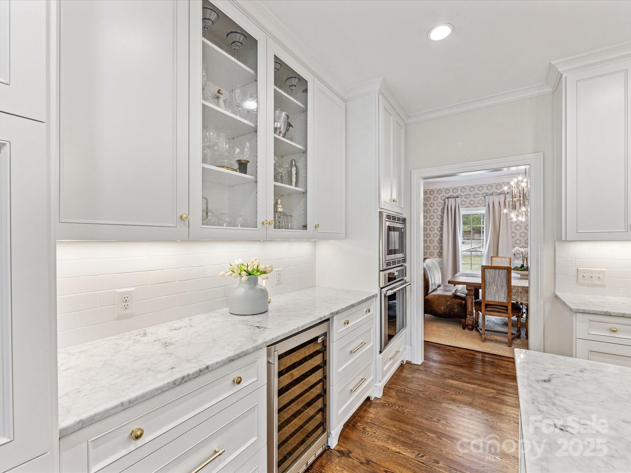 3137 Broadfield Road Charlotte, NC 28226 - Photo 7 of 42 a kitchen with sink and cabinets