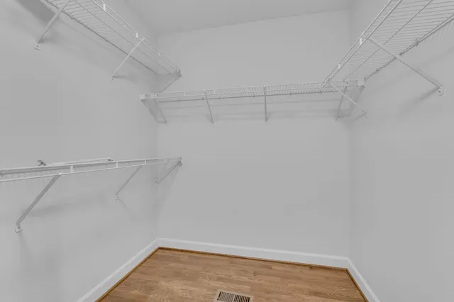 a view of a room with racks on the wall