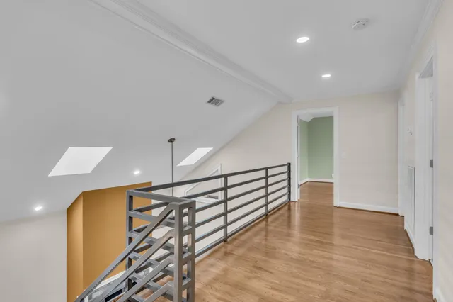 a view of entryway with wooden floor