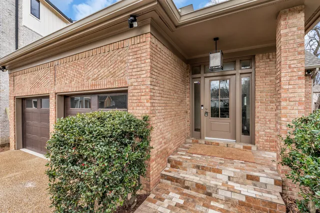 a view of entrance gate of a house