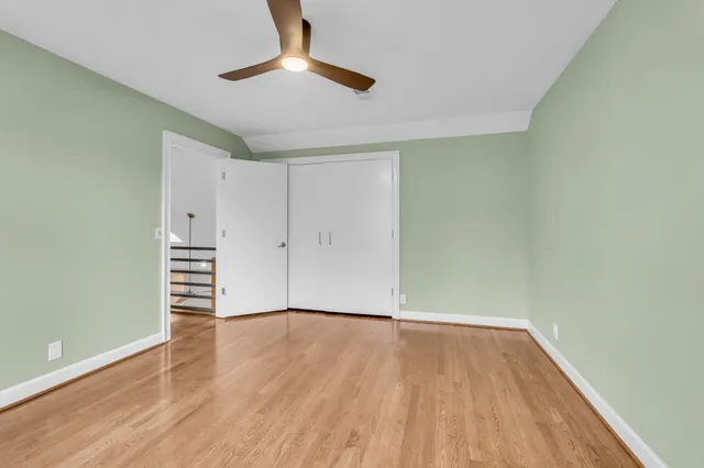 a view of a wooden house with a large window