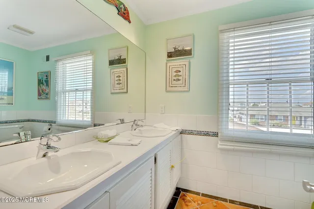 a view of a house with swimming pool and sitting area