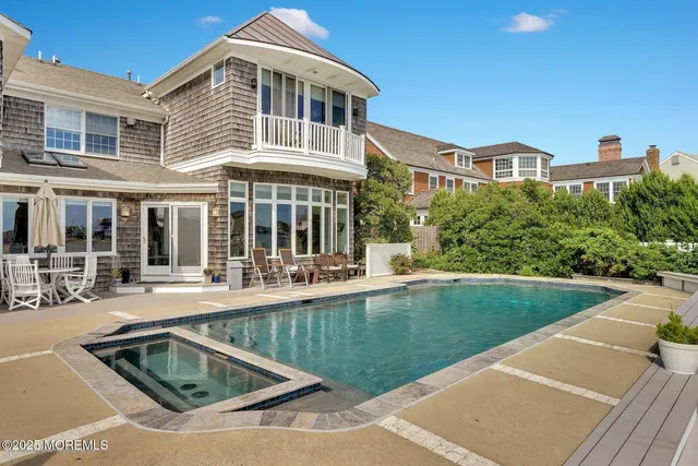 a view of roof deck with patio