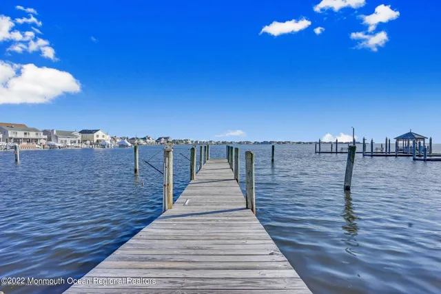 a view of a balcony with wooden floor