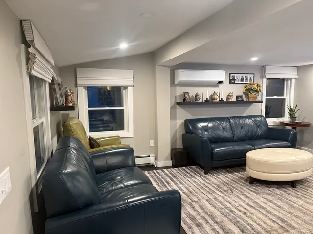 a living room with furniture and a couch