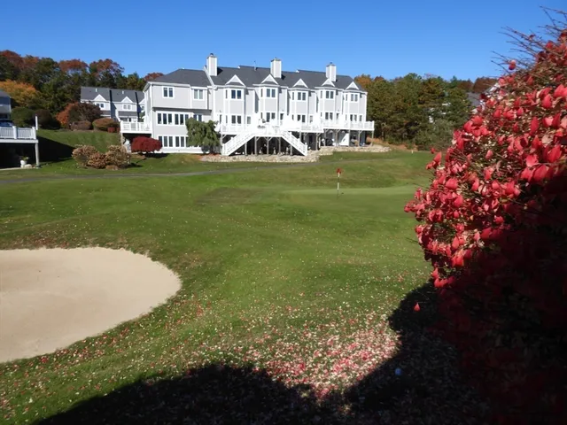 a view of a house with a big yard