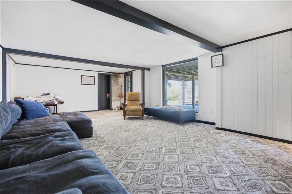 1663 Hastings Mill Road Upper St. Clair, PA 15241 - Photo 36 of 37 Large gameroom with beautiful carpeting and custom beams.