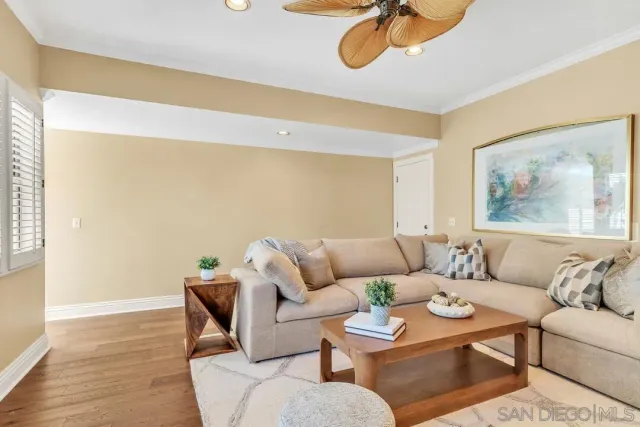 a kitchen with cabinets appliances and a window