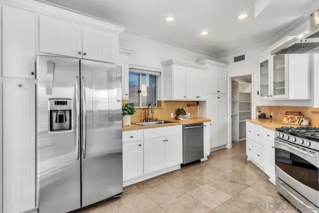 a bedroom with a bed and a lamp