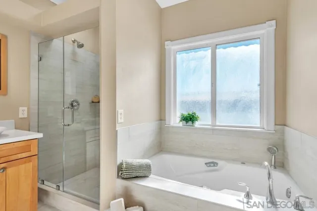 a outdoor space with patio couches and a potted plant