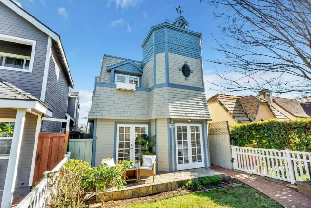a front view of a house with a yard outdoor seating and barbeque oven