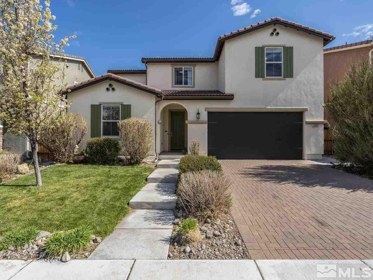 2055 Peaceful Valley Drive Reno, NV 89521 - Photo 1 of 26 a front view of a house with a yard